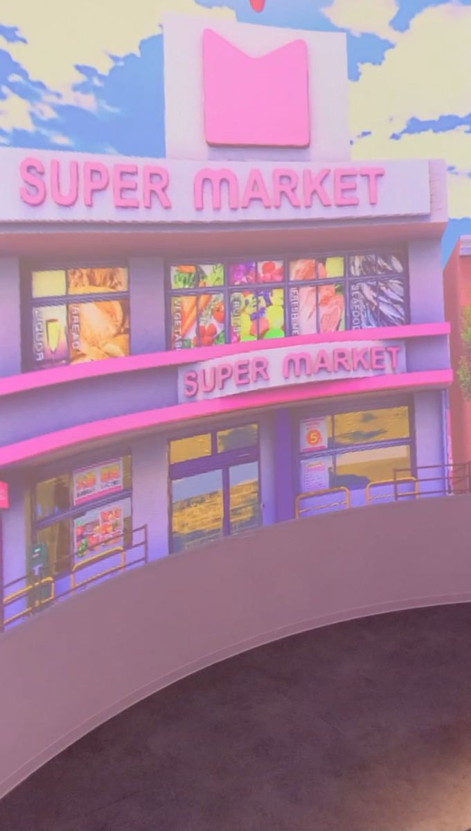 The simulated supermarket at the end of the walker course, displayed on a wraparound screen