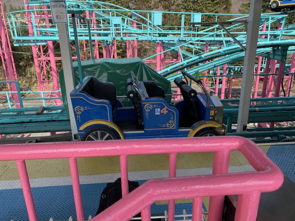 A family-sized coaster car on one of the park's gentler coasters