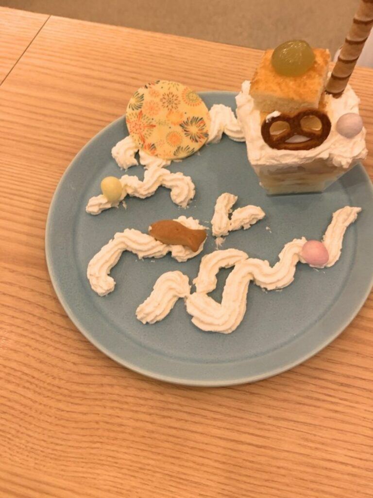 A decorated cake made by our daughter at Kids Studio